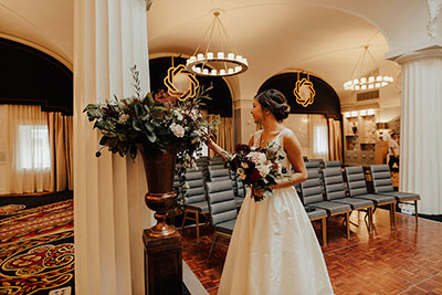Bride with flowers in wedding venue