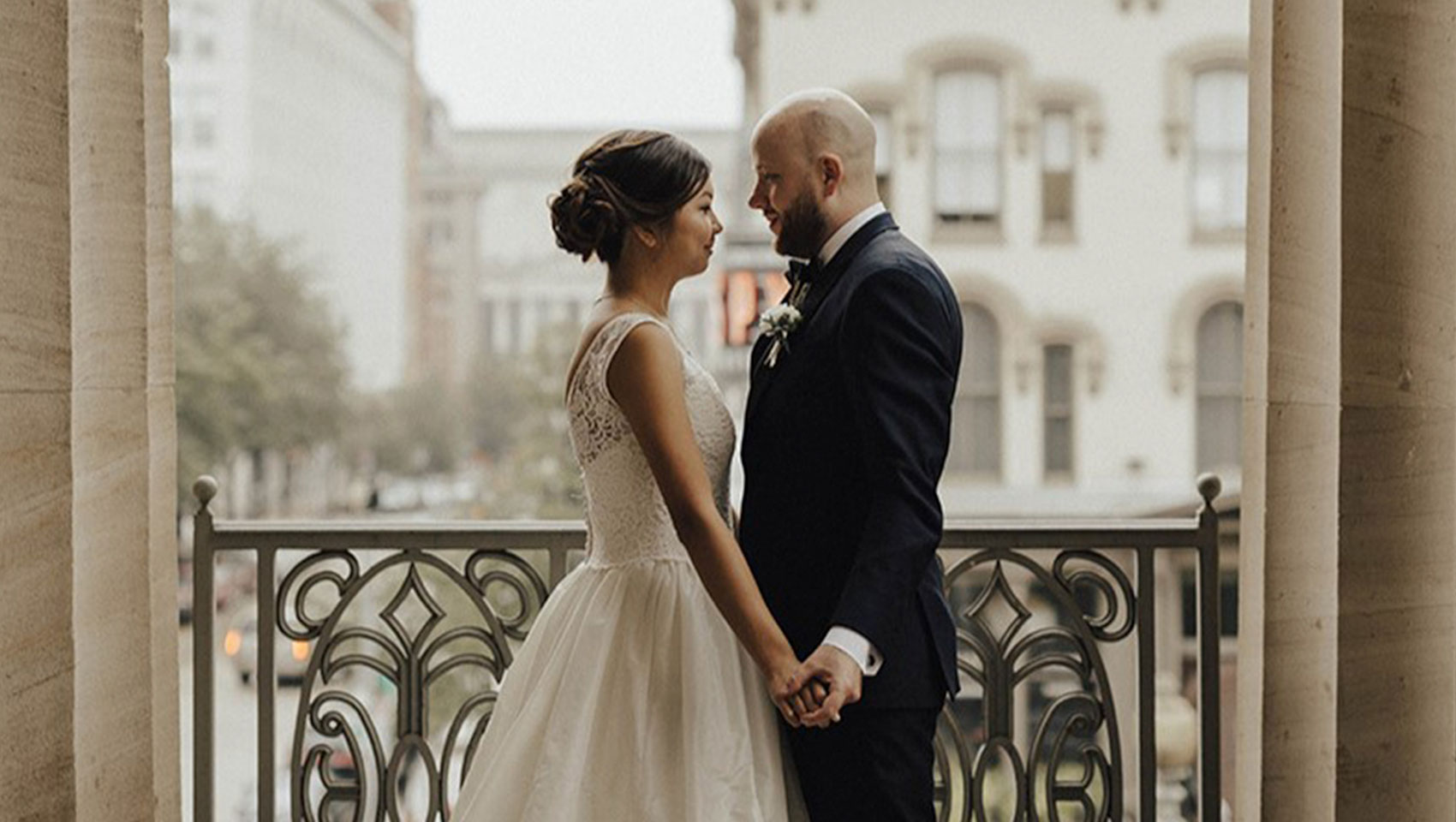 Newlyweds on balcony