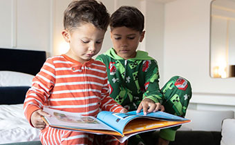 boys on bed reading